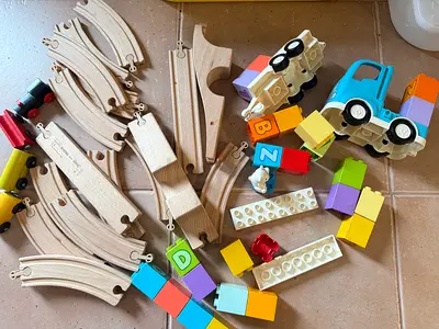 My wooden train set with cars and Lego alphabet building blocks