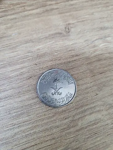 600 year old Collectible coin (palm tree  crossed swords design)