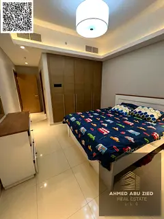 Luxury furnished 1BR apartment in Gulfa Towers, Ajman. 2 baths, balcony open view, central AC, prime