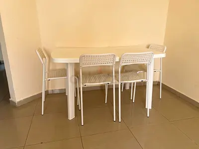 Plastic Dining table with 4 IKEA chairs for sale