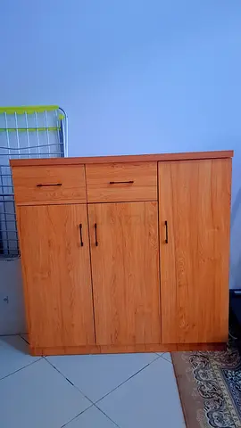 Wood-effect storage cabinet with drawers — compact cupboard