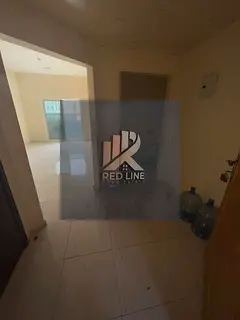 For Annual Rent: Two-Bedroom Apartment with Living Room, Balcony, and Parking in Jamal Abdul Nasser