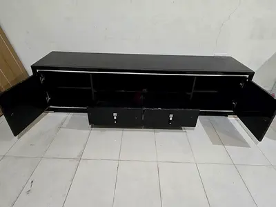 Black low TV cabinet - entertainment center