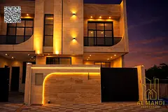 Villa for sale in Ajman, two floors and a roof, at a bargain price including fees. Excellent locatio