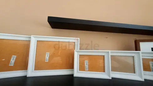 Set of 8 white photo frames (assorted sizes) as good as new