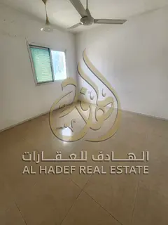 2 Bedroom Apartment for Rent in Maisaloon Sharjah Near Kuwait Roundabout Balcony Family Building Sui
