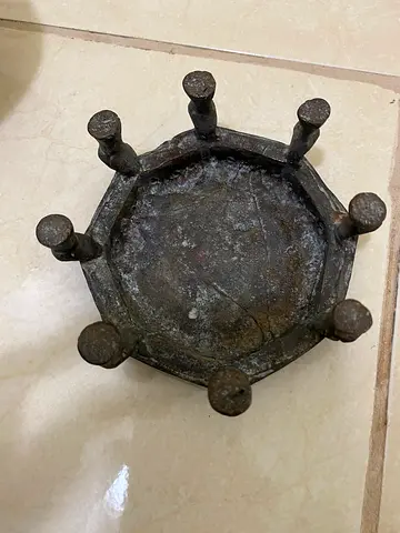 Antique metal holder