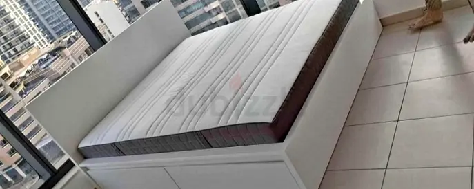 l brimness  Day bed with 2 storage drawers underneath and with 2 IKEA mattresses is available