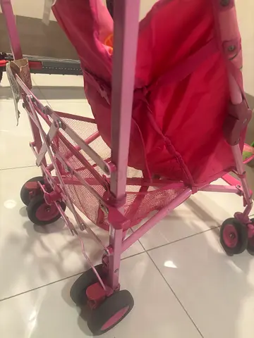 Pink lightweight umbrella stroller - folds compactly