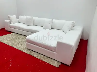 Excellent condition eichholtz brand lshape white sofa