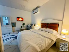 Furnished studio apartment with hotel-style furniture for monthly rent in Ajman - Al Rashidiya 3 - i