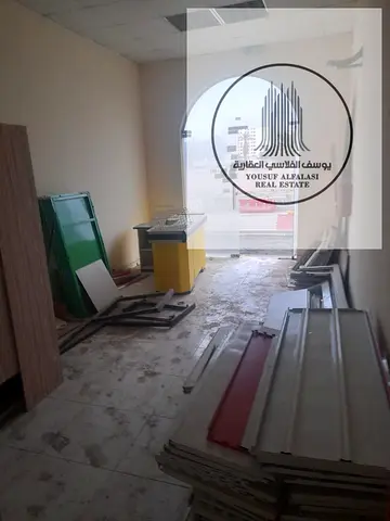 Shop 32 sqm Rashidiya 2 prime location 4 cheques 147258369