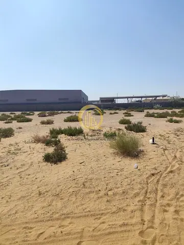 For sale: industrial land in the Emirates Industrial Area, Al-Sajaa, with an area of 29,300 sq. ft. Freehold ownership for Arabs and 99-year leasehold