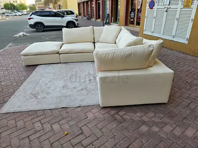 Modular feather filled luscious sofa and footstool