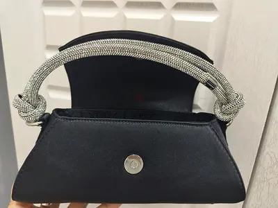 My black satin evening handbag with crystal braided handle