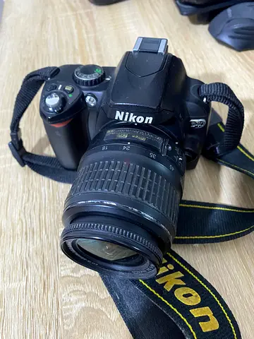 Nikon DSLR Camera with Lens