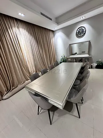 Dining Table set and 10 chairs with crockery shelf for 4000 AED