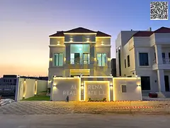 Two-story villa with a roof terrace, price inclusive of registration fees, in one of Ajman's mos