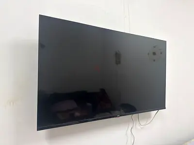 Wall-mounted LED TV - Good working condition
