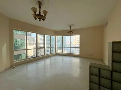 Luxury apartment for rent with bedrooms and a spacious living room, excellent view, free AC, gym & pool in Al Majaz 3.