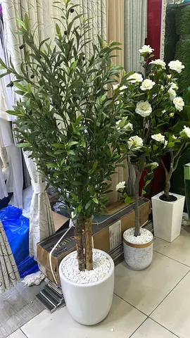 Large artificial olive plant with stylish pot