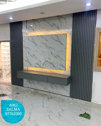 Marble-effect TV wall unit with floating console and LED backlight