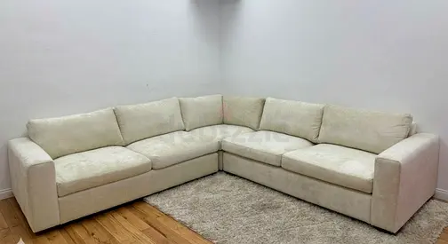 Expensive quality pottery barn beige color corner sofa