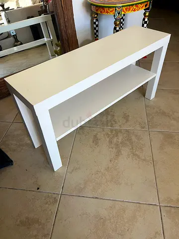 White wooden low shelf