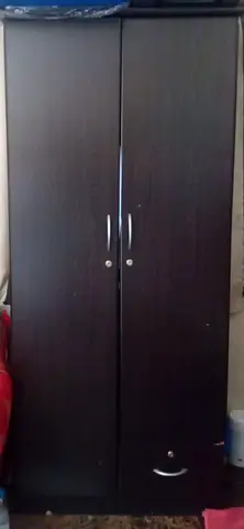 My dark brown 2-door wardrobe with bottom drawer