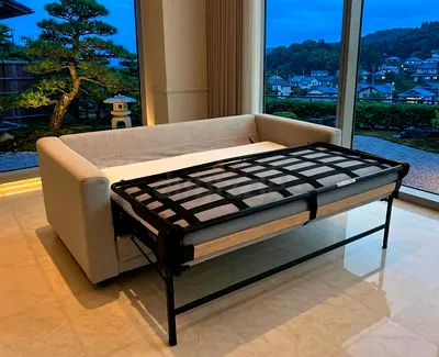 Beige Pull-Out Sofa Bed — Comfortable Sleeper, Good Condition