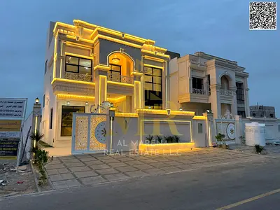 Two-story villa with a roof terrace, price inclusive of registration fees, in one of Ajman's most prestigious areas. Freehold ownership available to a