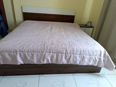 2 Wooden bed frame with headboard and side tables — used, good condition