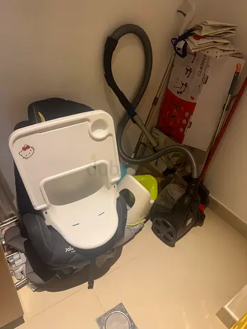 Used baby booster/high chair with removable tray and safety harness and toddler toys plus cot