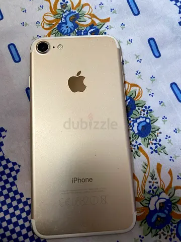 Used Gold iPhone — Fair condition, some back damage