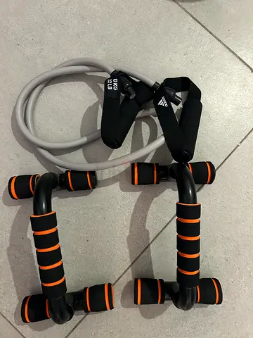 Push-up bars with 22lb Adidas resistance tube