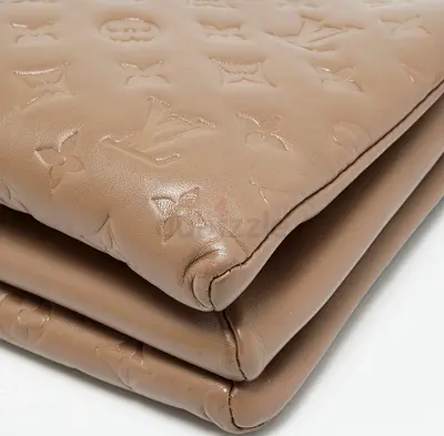 Louis Vuitton Monogram-Embossed Beige Leather Clutch