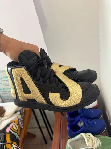 Stylish Black and Gold Sneakers