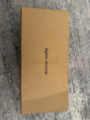 Dyson air wrap with 3 attachments and cleaning brush