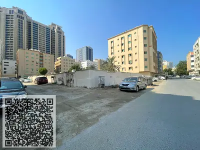 A plot of land in a prime location for sale in Ajman, Al Rashidiya 2 area, near Al Rashidiya Towers.