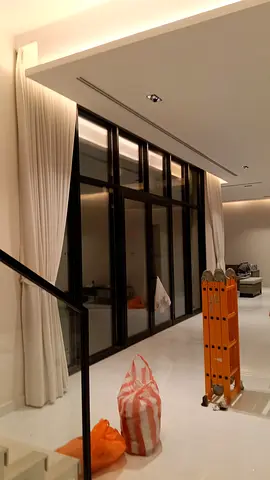 Floor-to-ceiling cream curtains — good condition