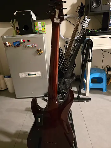 My 7-string electric guitar — quilted amber top, good condition