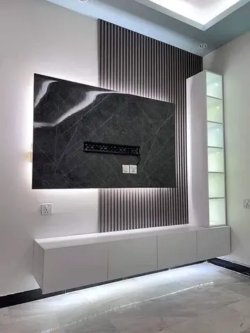 My modern wall-mounted TV entertainment unit with LED backlit marble panel