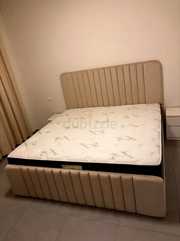 Selling my beige upholstered bed frame with mattress