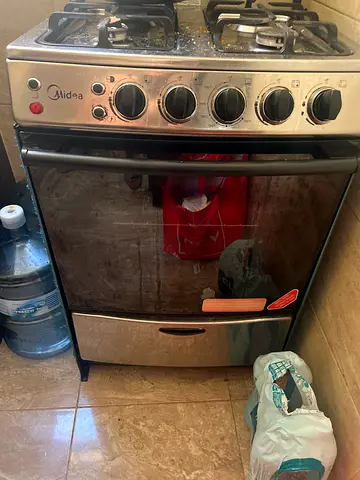 Midea 4-burner gas stove with oven - working condition