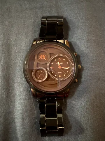 Pre-owned black men’s metal bracelet analog watch