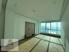 Luxury apartment for sale with a panoramic view of the Corniche and Khan Lake, high-end finishing, d