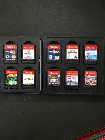 Nintendo Switch game cartridges bundle with storage case