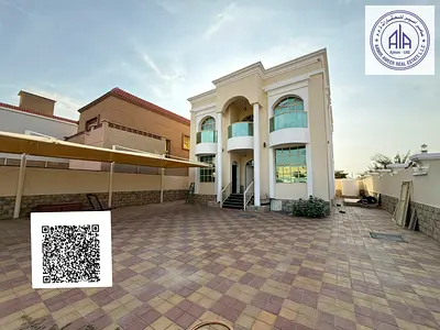 Residential and commercial villa for sale on a corner in Al Muweihat 1
