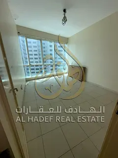 Three-bedroom apartment with a living room and a master maid's room for annual rent in Al Taawun