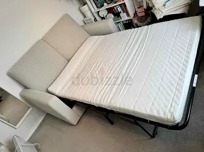 Beige 2-Seater Fabric Sofa Bed (Good Condition)